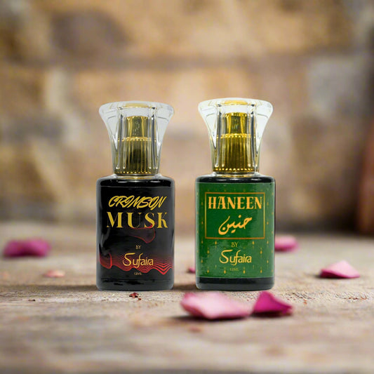 Two perfume bottles labeled 'Crimson Musk' and 'Haneen' by Sufaira