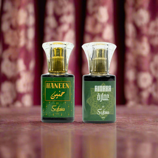 Two green perfume bottles labeled 'Haneen' and 'Amara' by Sufaira .